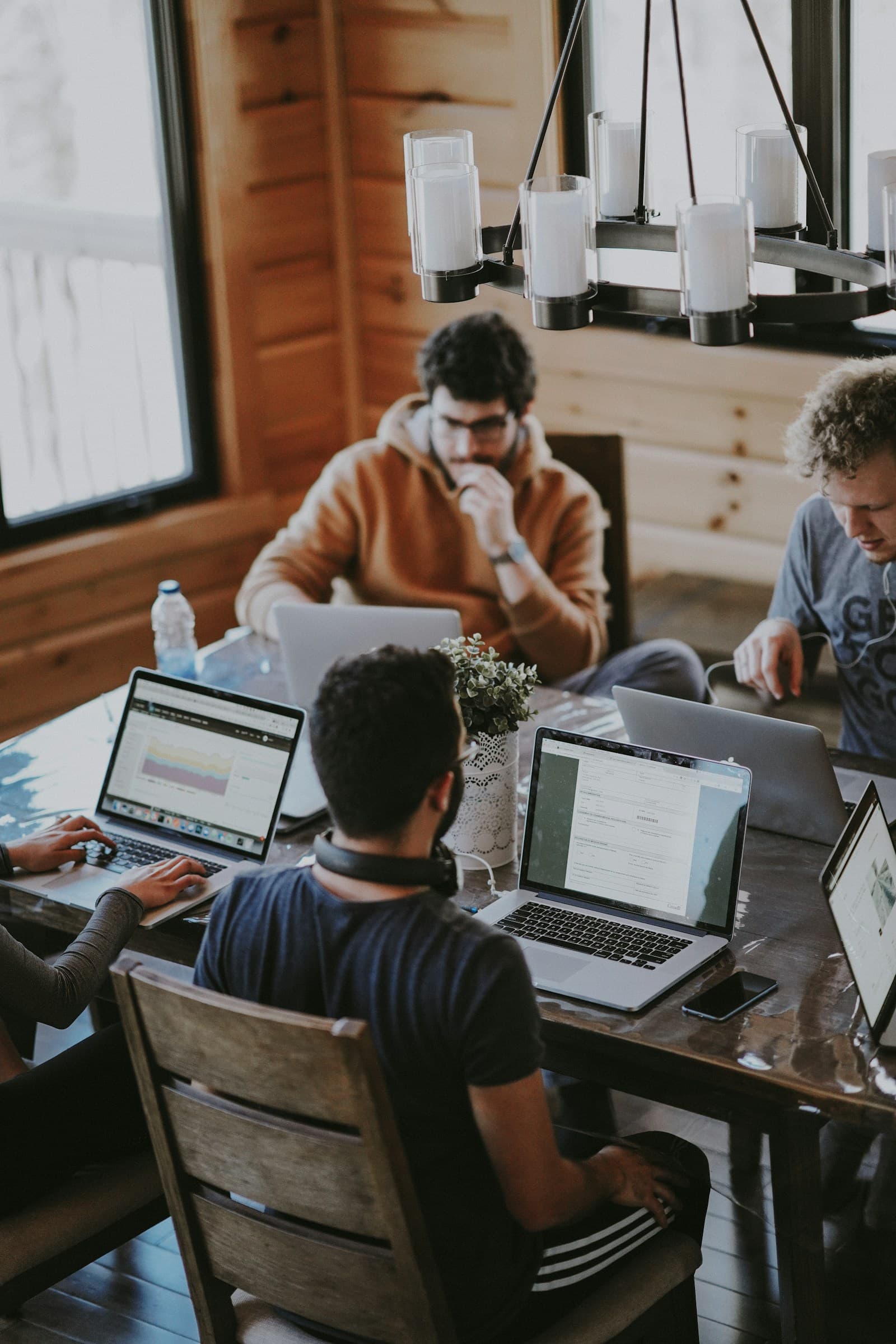 A small team working together around a table